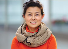 Photo of a woman smiling for a picture. Link to Life Stage Gift Planner Under Age 45 Situations.