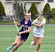 Girls playing lacrosse. Link to Gifts of Life Insurance.