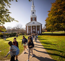 Students walking on campus. Link to Tangible Personal Property.